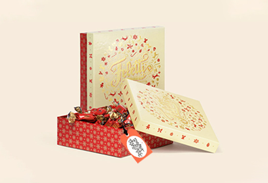 decorate box exterior with festive tags or stickers