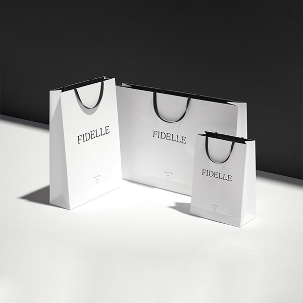 small white paper bags